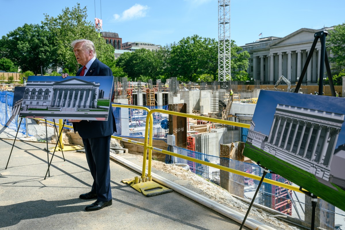 Ballroom and East Wing construction site with architectural presentation boards