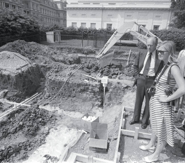President Ford surveys construction of an outdoor swimming pool in 1975