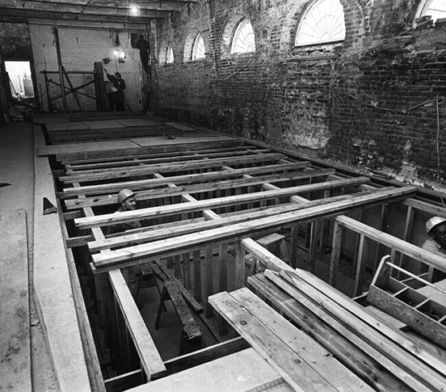 Construction converting the former swimming pool into expanded press space in 1970