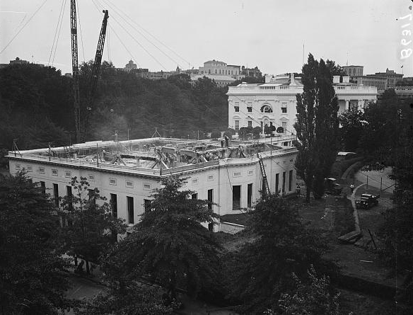 Construction of the West Wing expansion in 1934